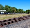 Scappoose Sign with Tracks